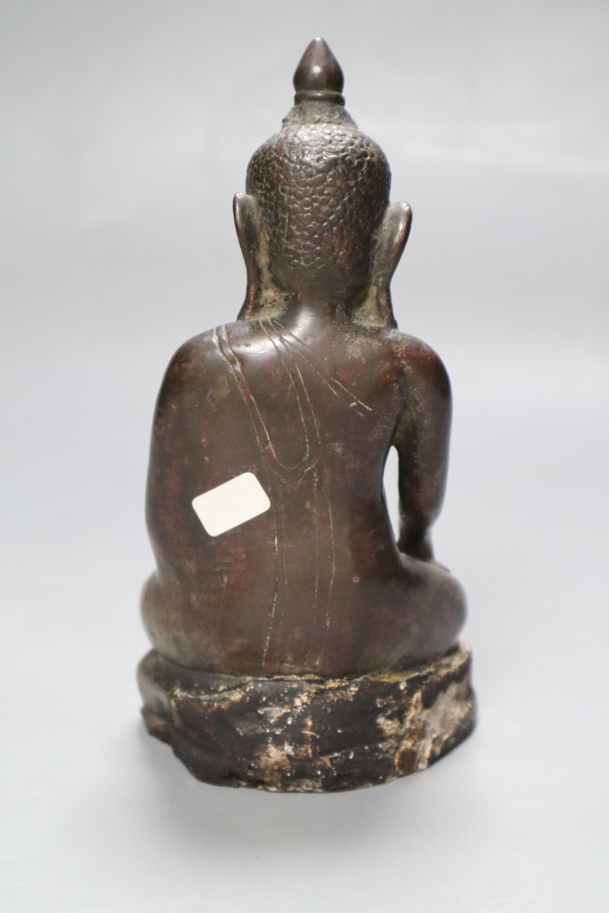 An 18th/19th century Burmese bronze figure of Buddha Shakyamuni, height 16cm